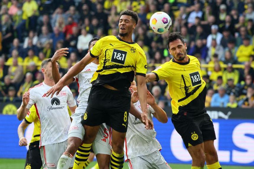 Borussia Dortmund secure second place with dominant win over Freiburg