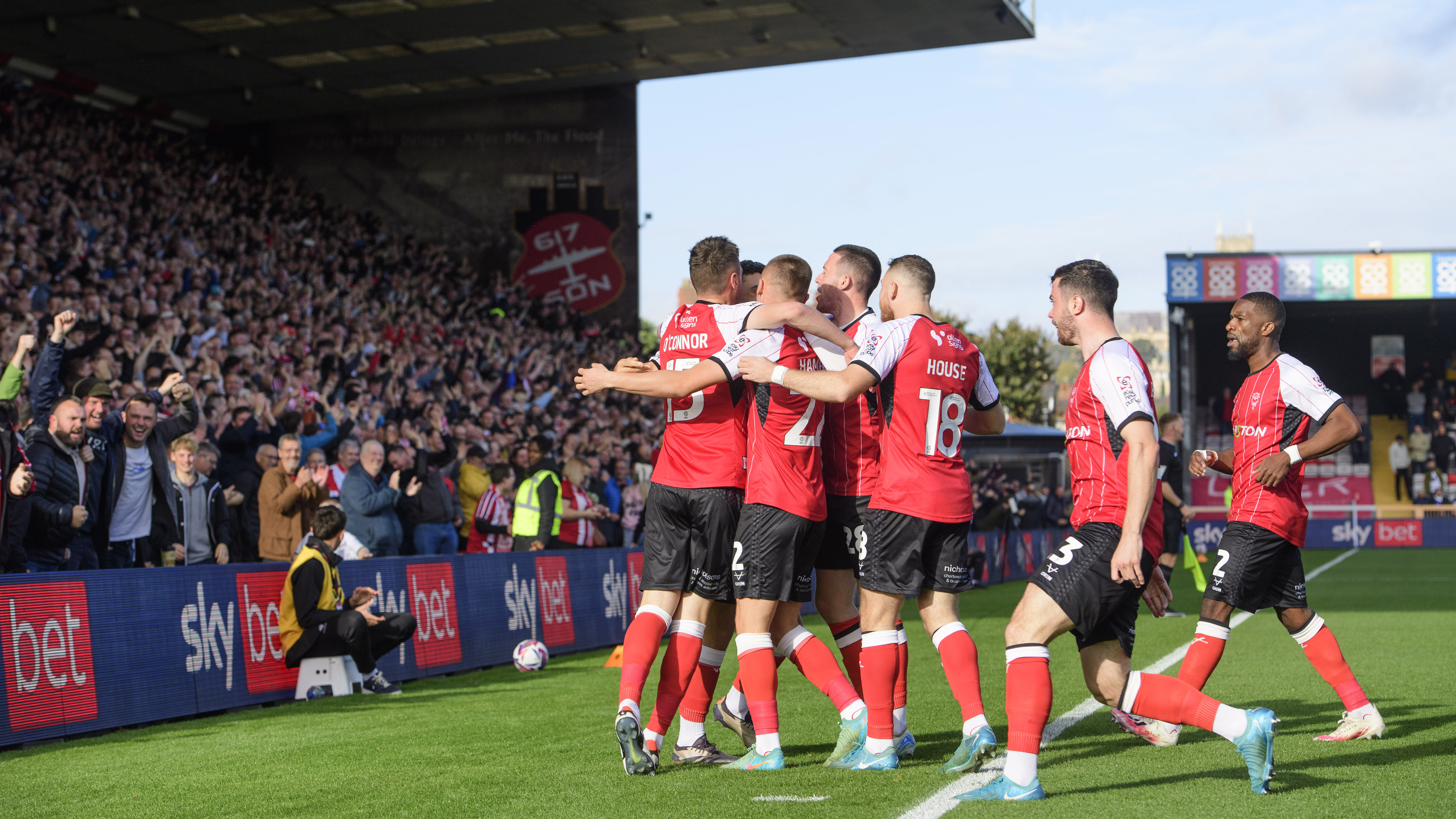 Lincoln City secure historic promotion to Championship after 65-year absence
